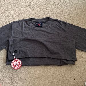 Grey tshirt with a bottle opener